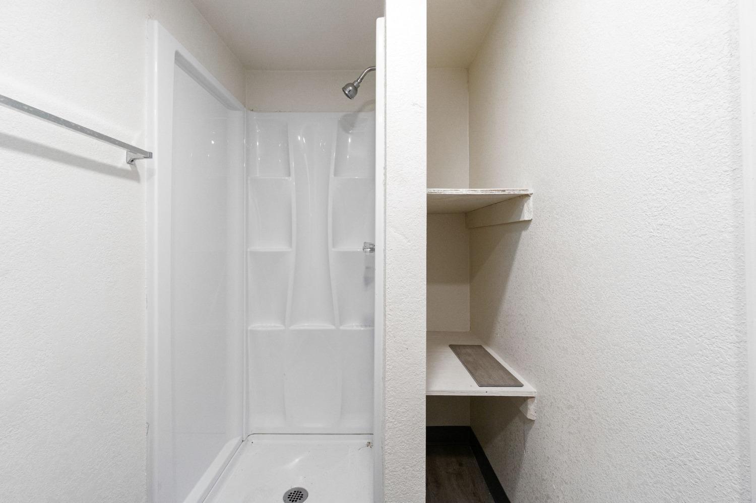 46801 Dunlap Road Miramonte, CA 93641 - Photo 16 of 28 a bathroom with a shower