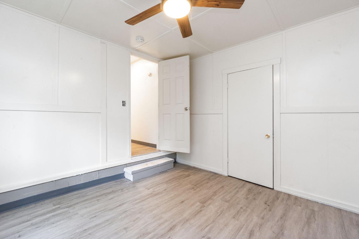 46801 Dunlap Road Miramonte, CA 93641 - Photo 18 of 28 a view of an empty room with wooden floor