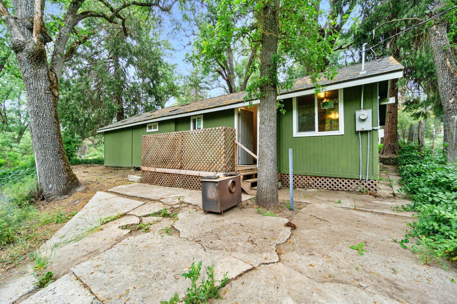 46801 Dunlap Road Miramonte, CA 93641 - Photo 20 of 28 a view of a house with backyard and trees
