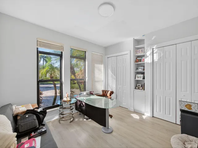 a living room with furniture and window