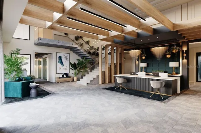 a view of a patio with table and chairs