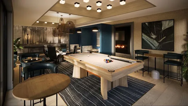 a kitchen that has a table and chairs in it