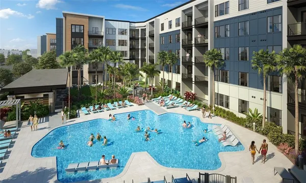 a front view of a house with glass windows and plants