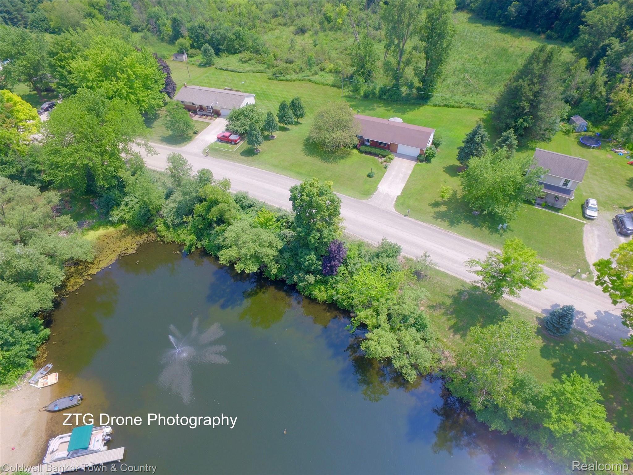 2442 Fisher Road Howell, MI 48855 - Photo 24 of 25 DJI_0037.jpg