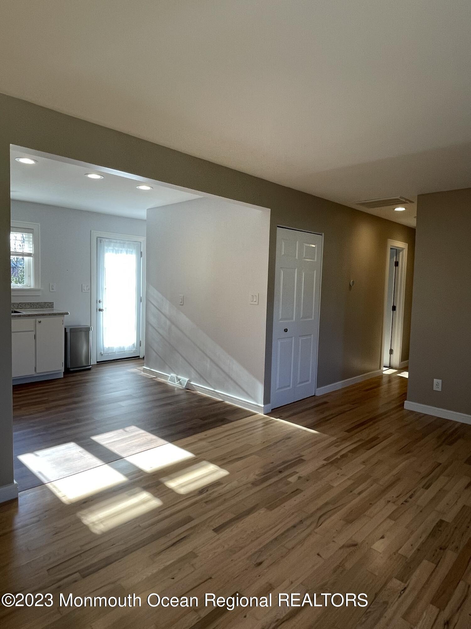 25 Middlesex Road Matawan, NJ 07747 - Photo 13 of 37 Family room open to kitchen