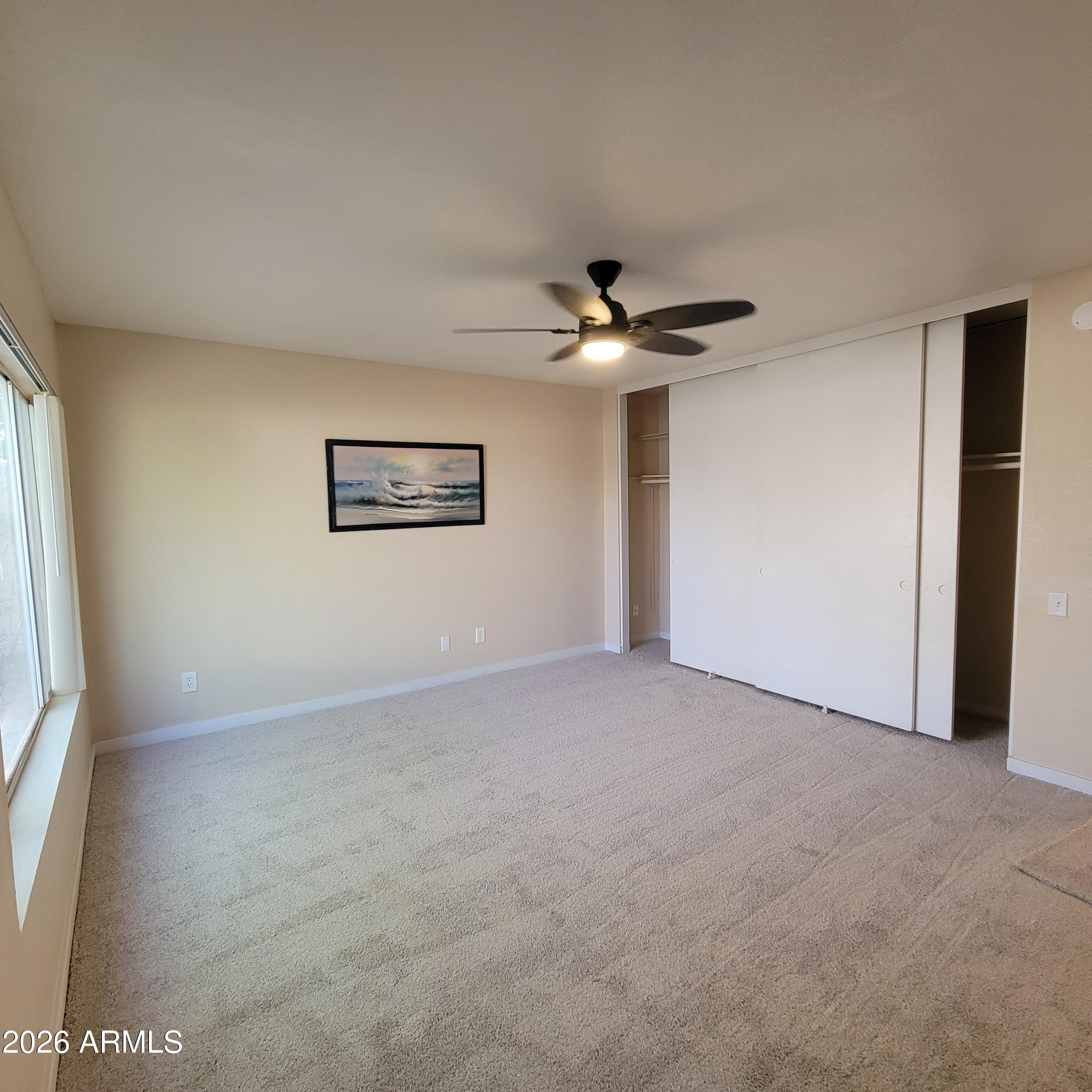 5605 South Spinnaker Road Tempe, AZ 85283 - Photo 11 of 26 a view of a livingroom with a window