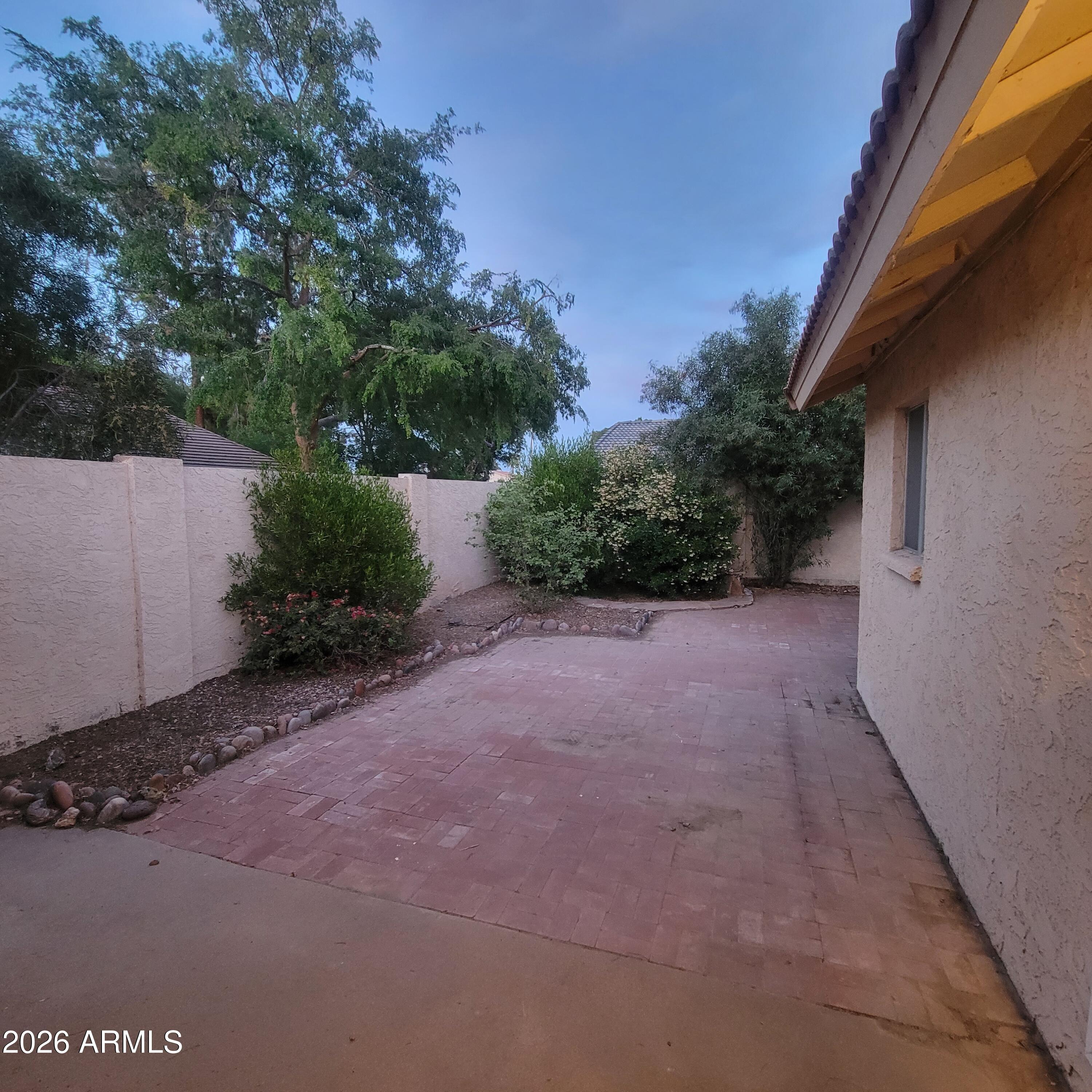 5605 South Spinnaker Road Tempe, AZ 85283 - Photo 19 of 26 a view of a backyard of the house