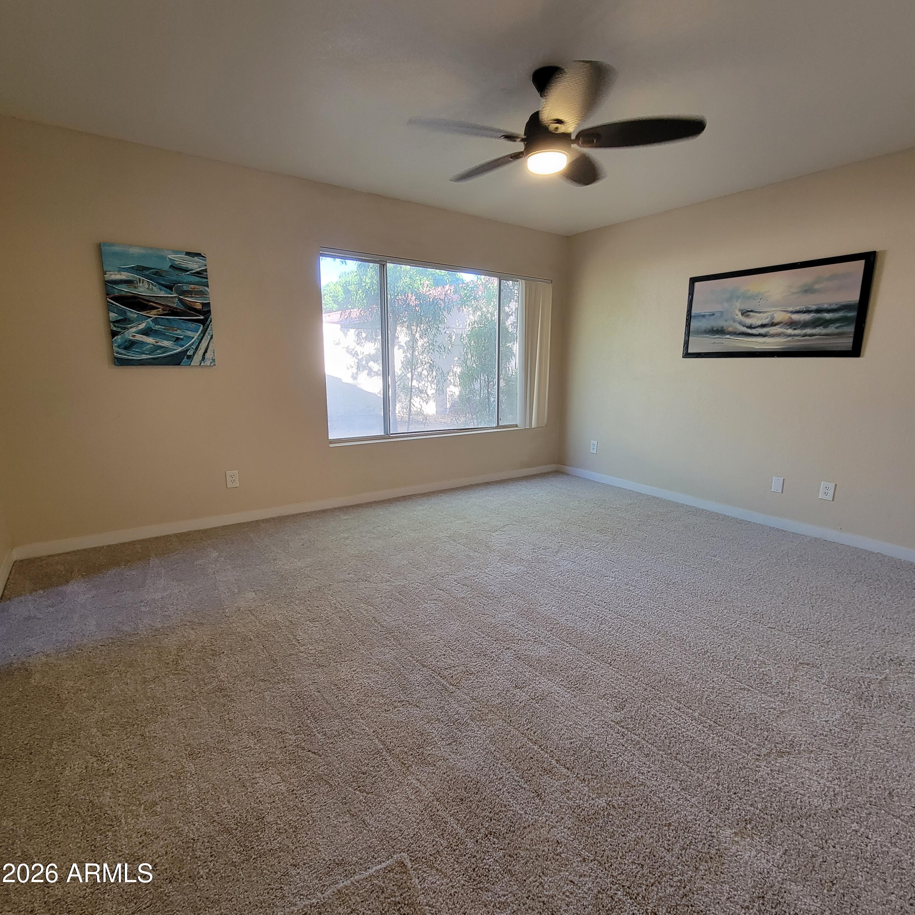 5605 South Spinnaker Road Tempe, AZ 85283 - Photo 10 of 26 a view of empty room with windows