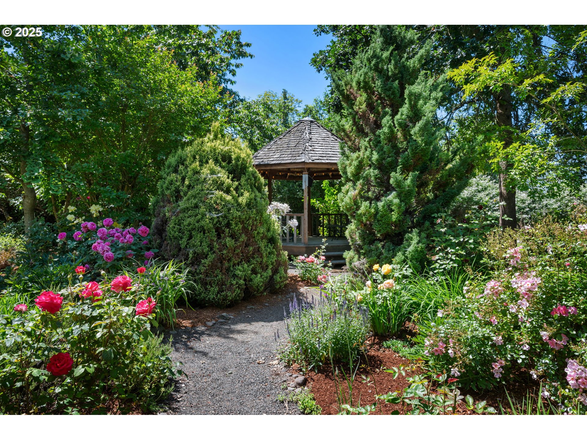 31255 South Kauffman Road Canby, OR 97013 - Photo 36 of 48 a view of a garden with flowers