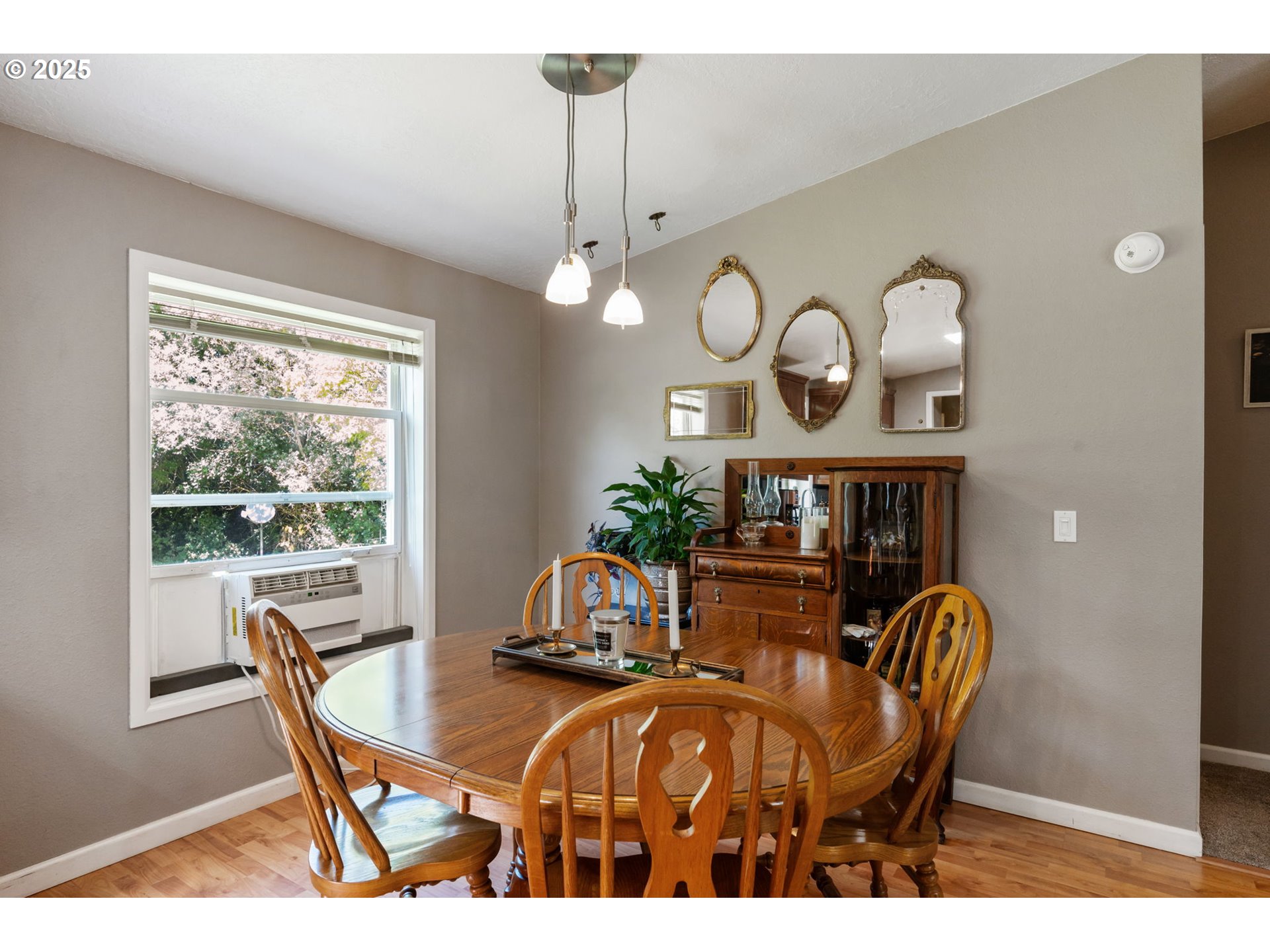 31255 South Kauffman Road Canby, OR 97013 - Photo 10 of 48 a view of a dining room with furniture window and wooden floor