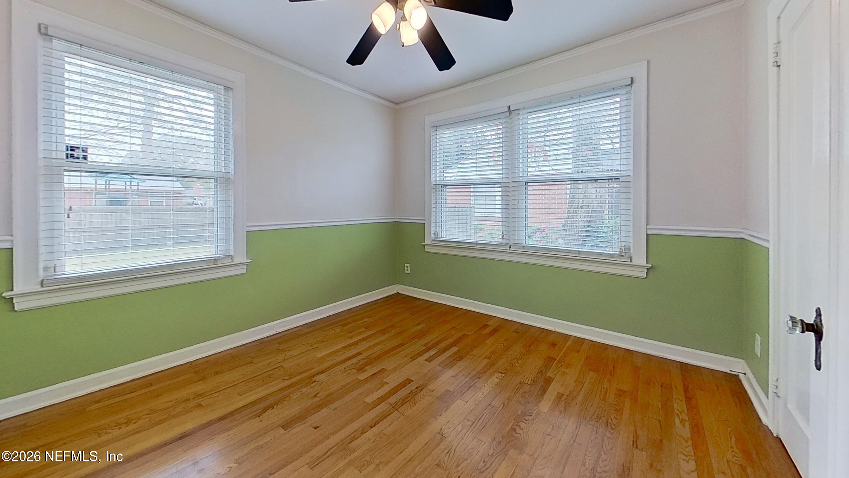 2151 Traymore Road Jacksonville, FL 32207 - Photo 14 of 18 a view of room with window and ceiling fan