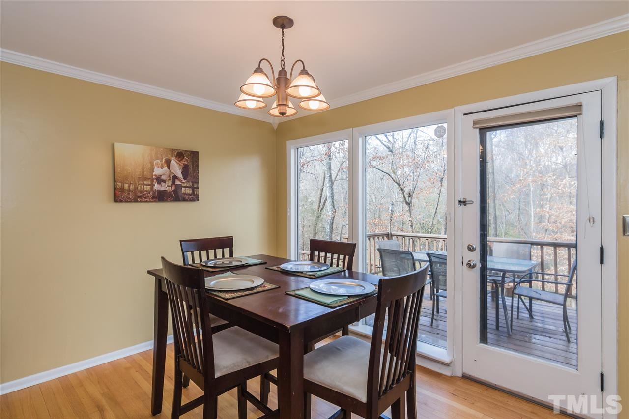 5 Sandstone Ridge Drive Durham, NC 27713 - Photo 8 of 25 a view of a dining room with furniture window and outside view