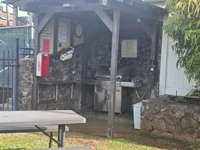 a balcony with table and chairs