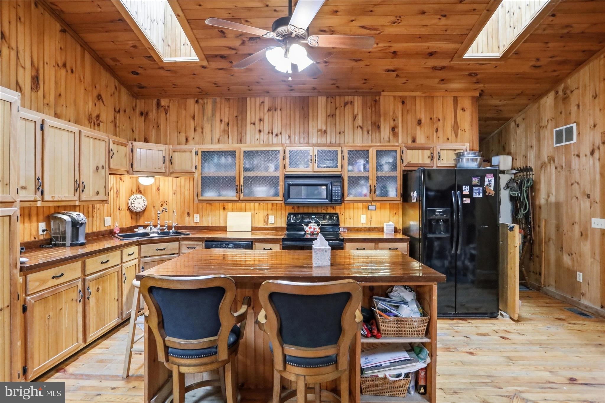 90 Shade Valley Road Rio, WV 26755 - Photo 11 of 41 a kitchen with a cabinets and chairs