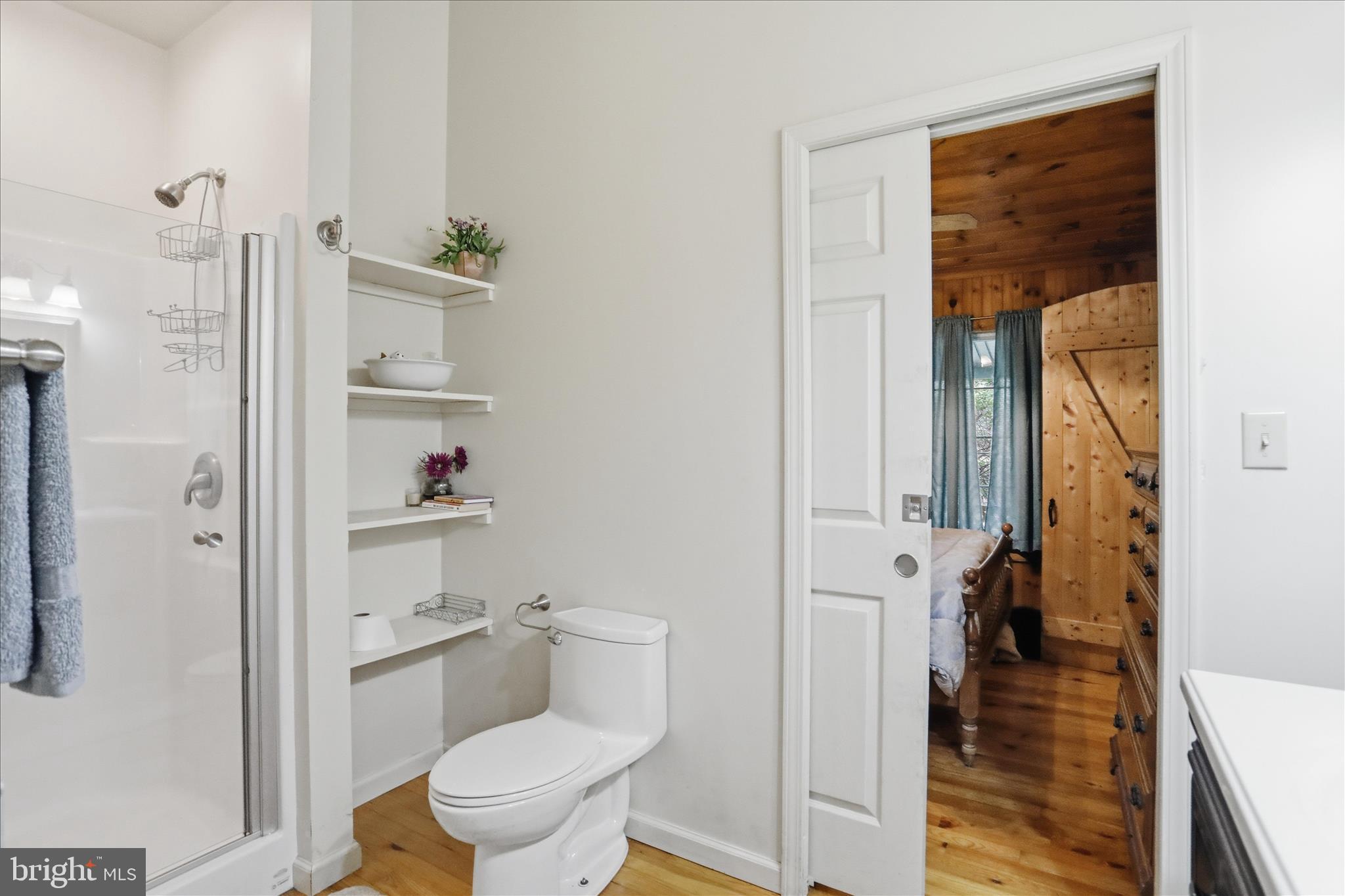 90 Shade Valley Road Rio, WV 26755 - Photo 20 of 41 a bathroom with a toilet a sink and shower