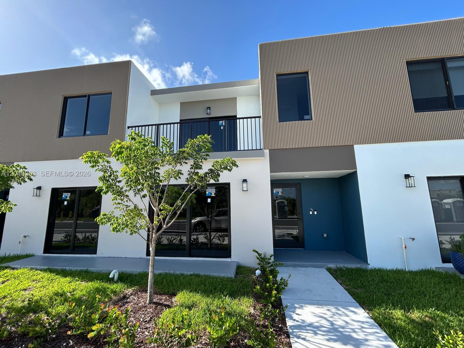 14569 Southwest 262nd Street, Unit 1 Homestead, FL 33032 - Photo 1 of 10