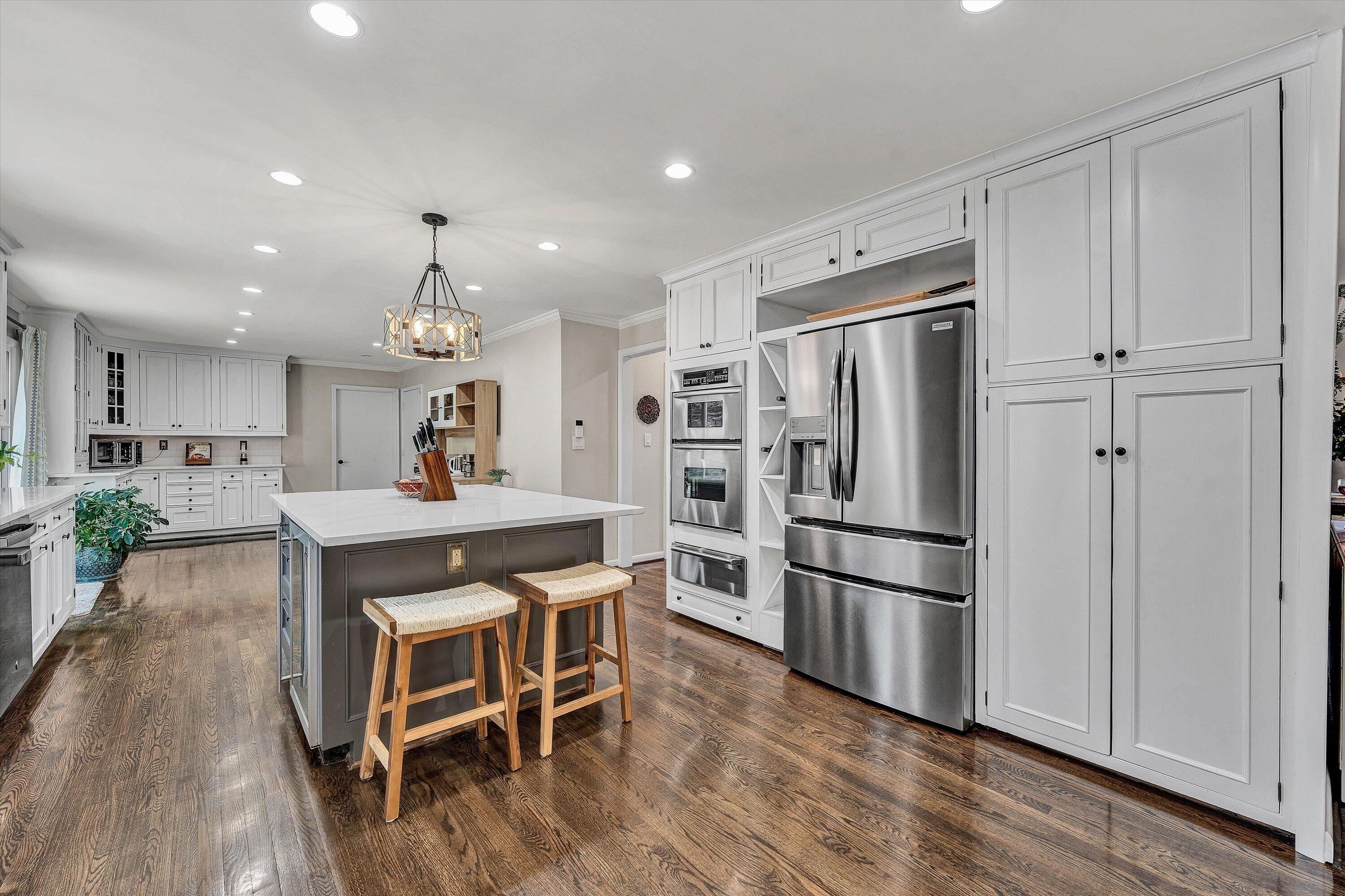 5157 Remington Road Roanoke, VA 24018 - Photo 19 of 63 a kitchen with stainless steel appliances refrigerator dining table and chairs