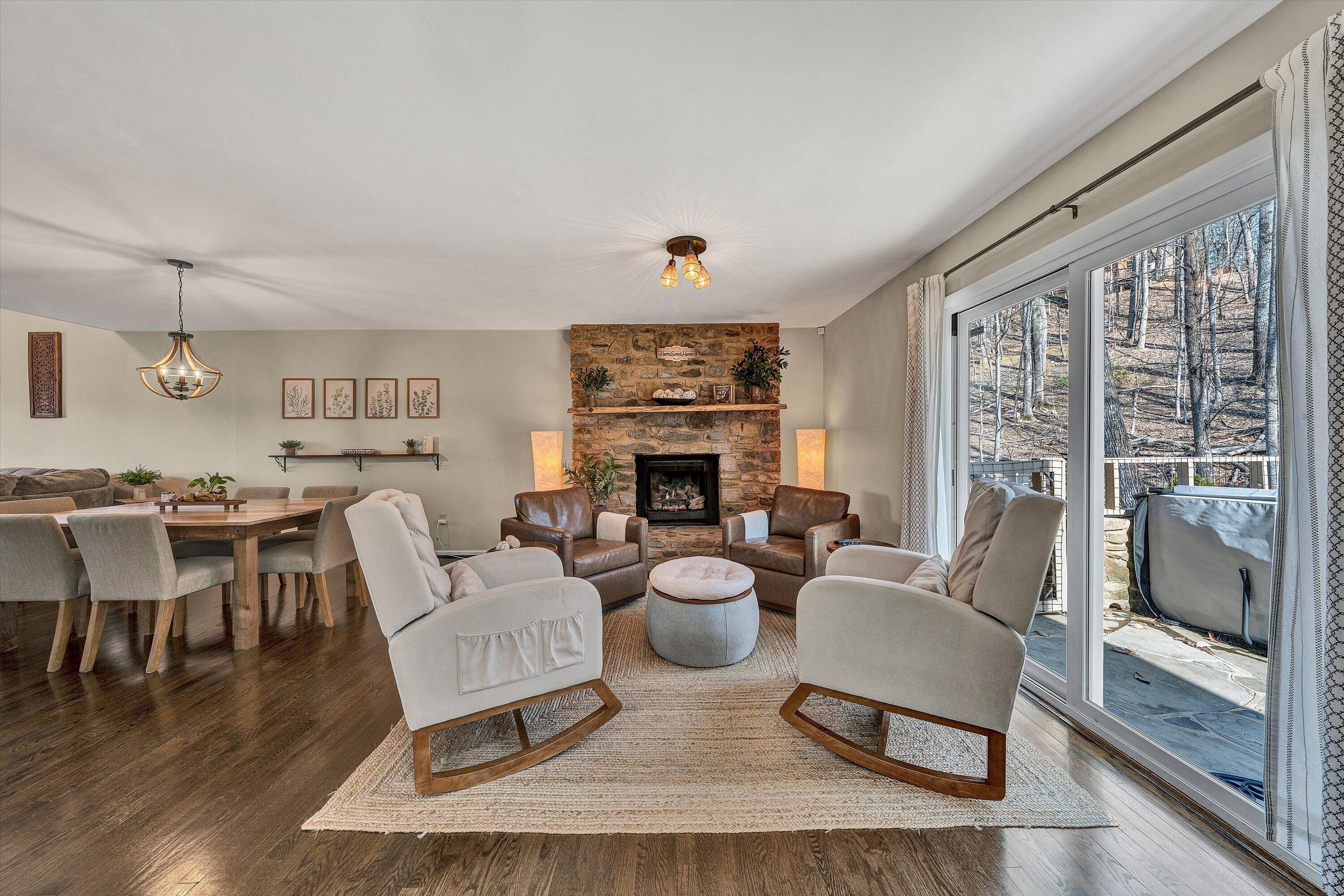 5157 Remington Road Roanoke, VA 24018 - Photo 22 of 63 a living room with furniture wooden floor and a fireplace