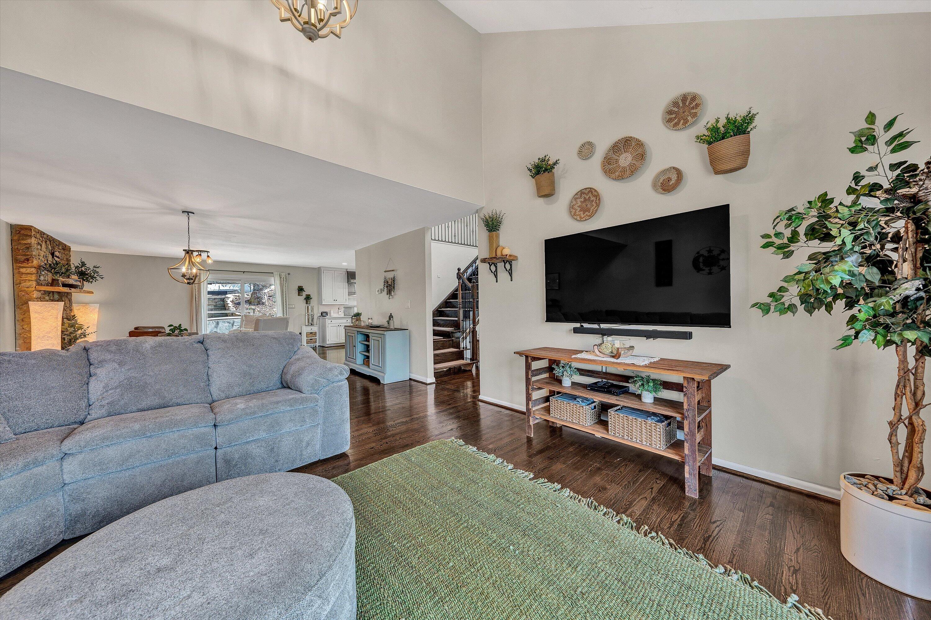 5157 Remington Road Roanoke, VA 24018 - Photo 24 of 63 a living room with furniture and a flat screen tv
