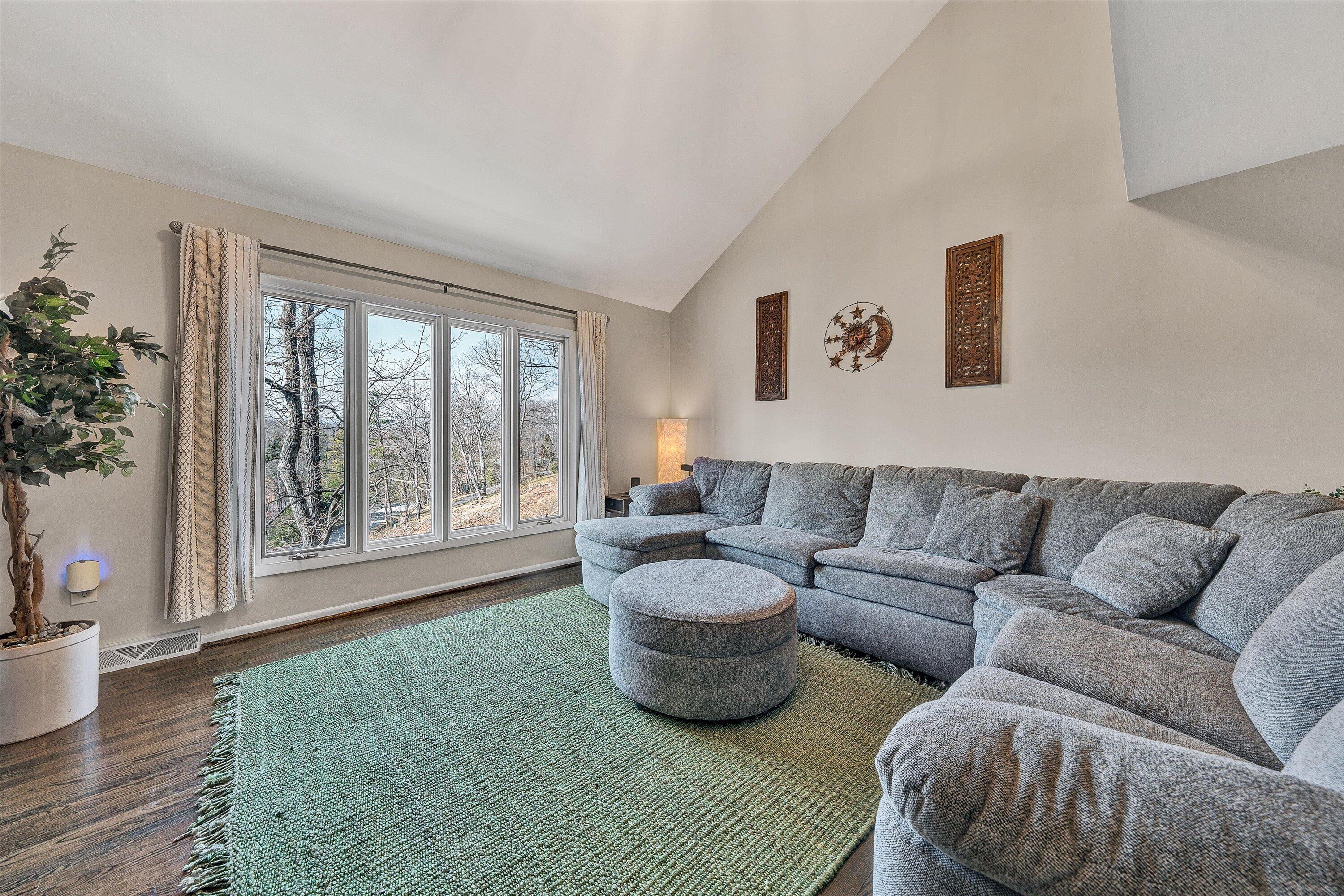 5157 Remington Road Roanoke, VA 24018 - Photo 25 of 63 a living room with furniture and a large window