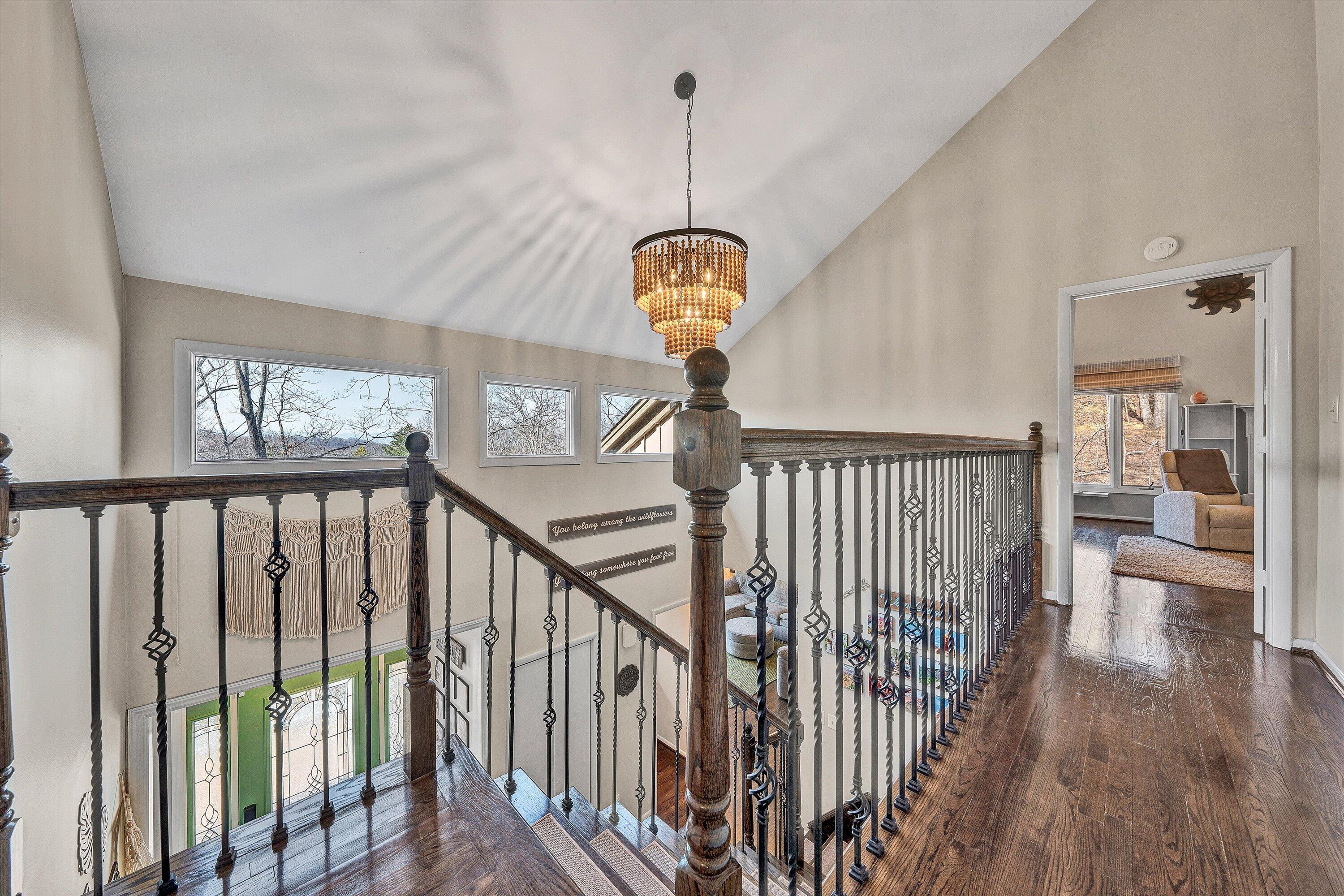 5157 Remington Road Roanoke, VA 24018 - Photo 26 of 63 a view of a hallway with wooden floor and windows