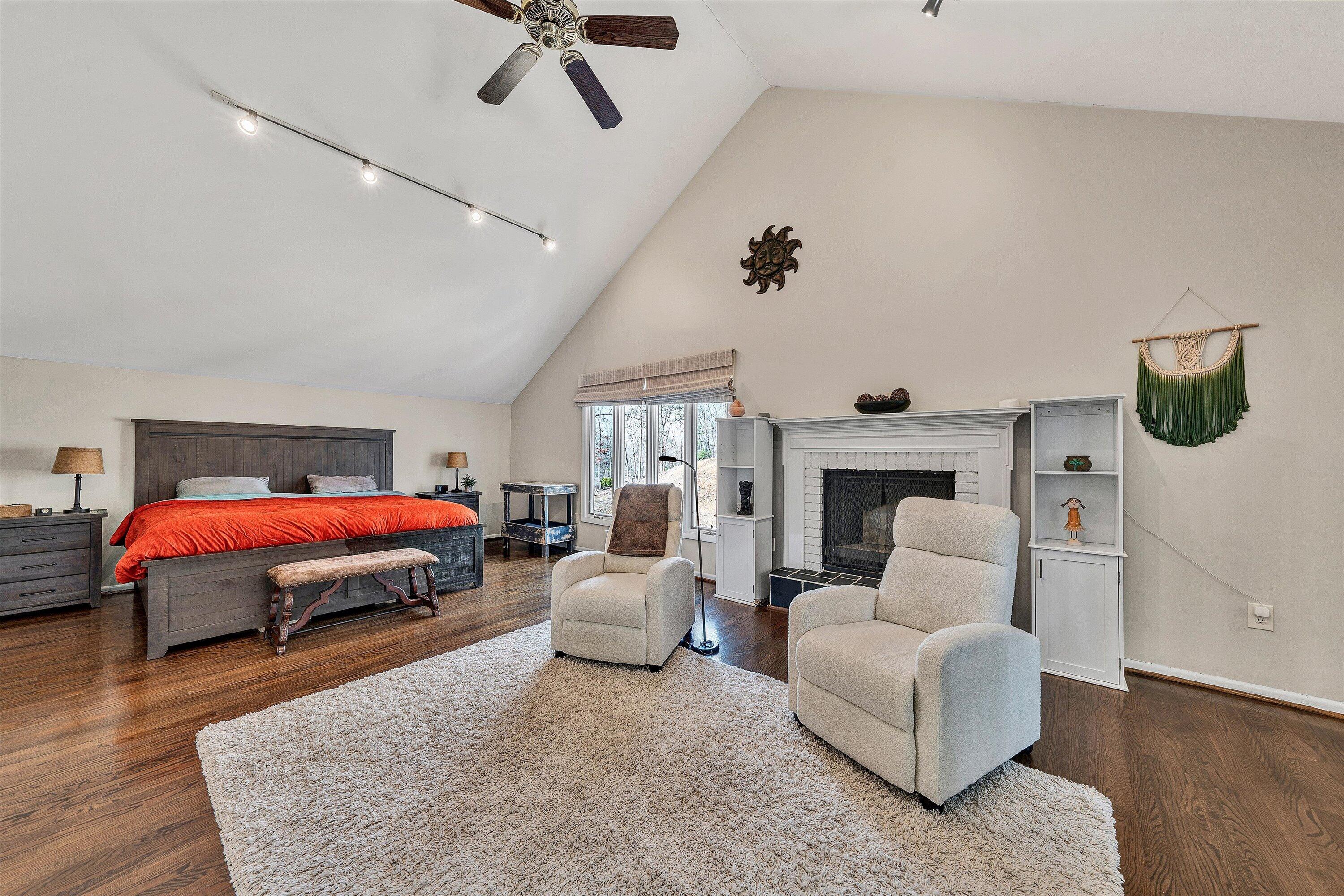 5157 Remington Road Roanoke, VA 24018 - Photo 28 of 63 a spacious bedroom with a bed a couch and dresser