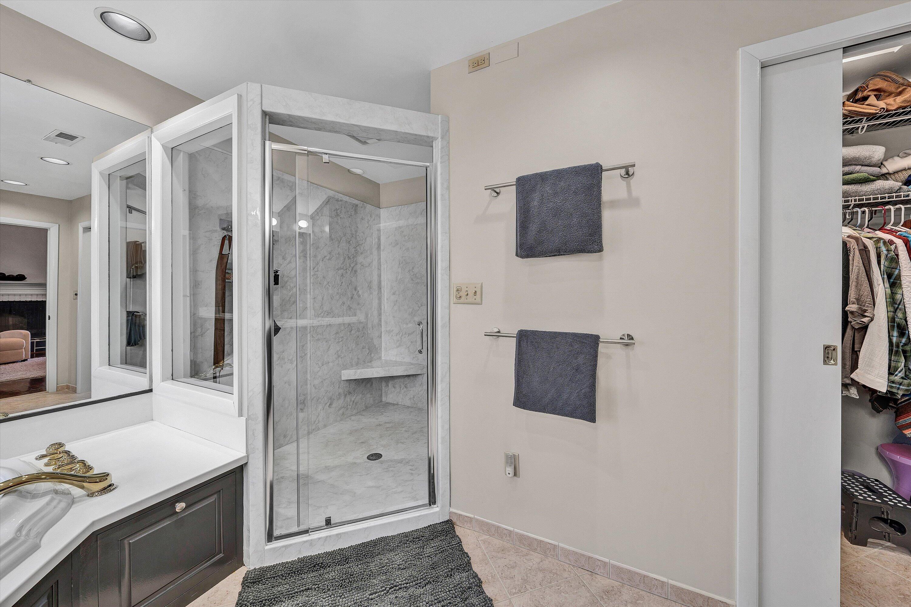 5157 Remington Road Roanoke, VA 24018 - Photo 31 of 63 a bathroom with a shower tub and mirror