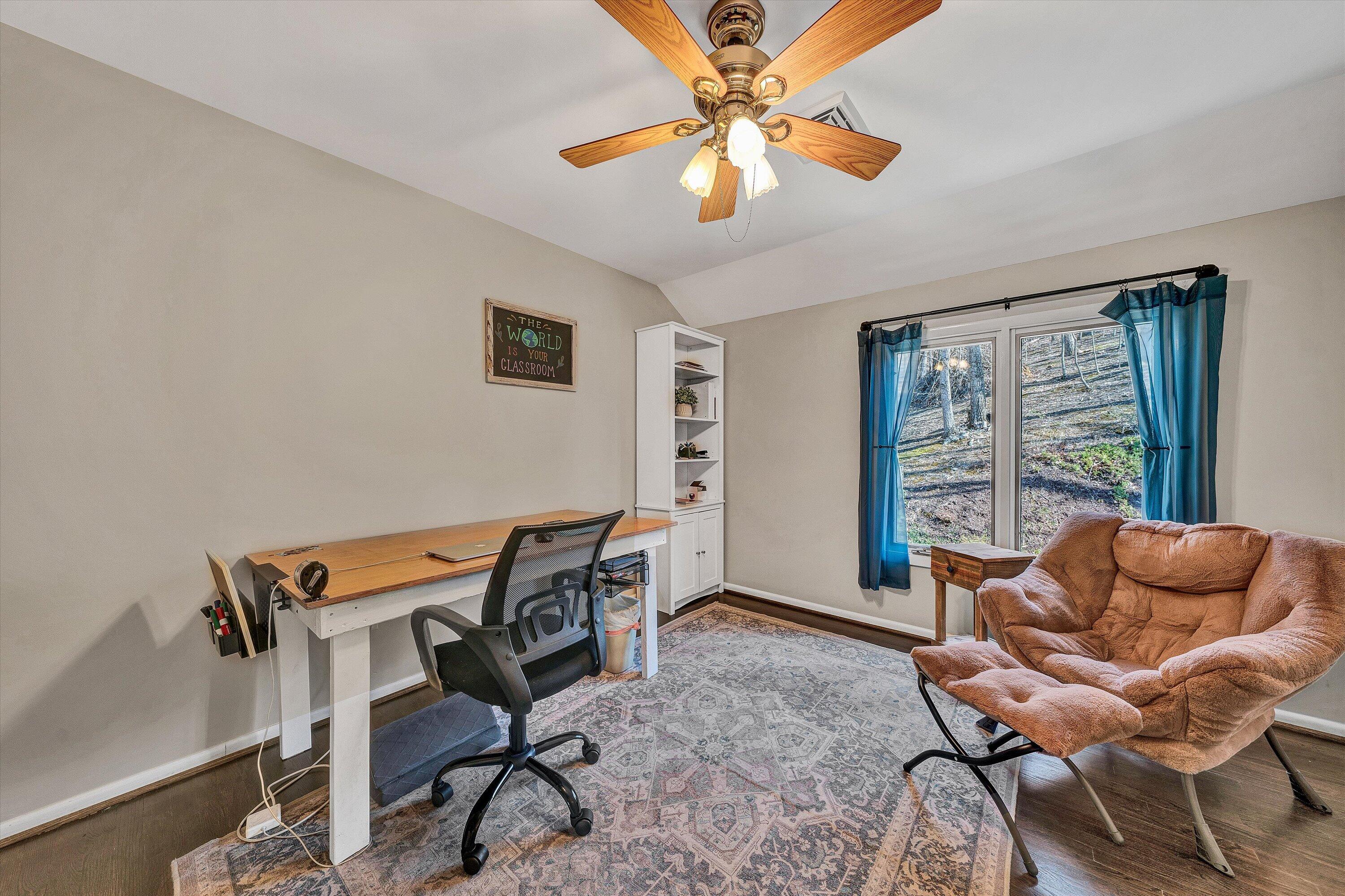 5157 Remington Road Roanoke, VA 24018 - Photo 35 of 63 a work room with furniture and windows