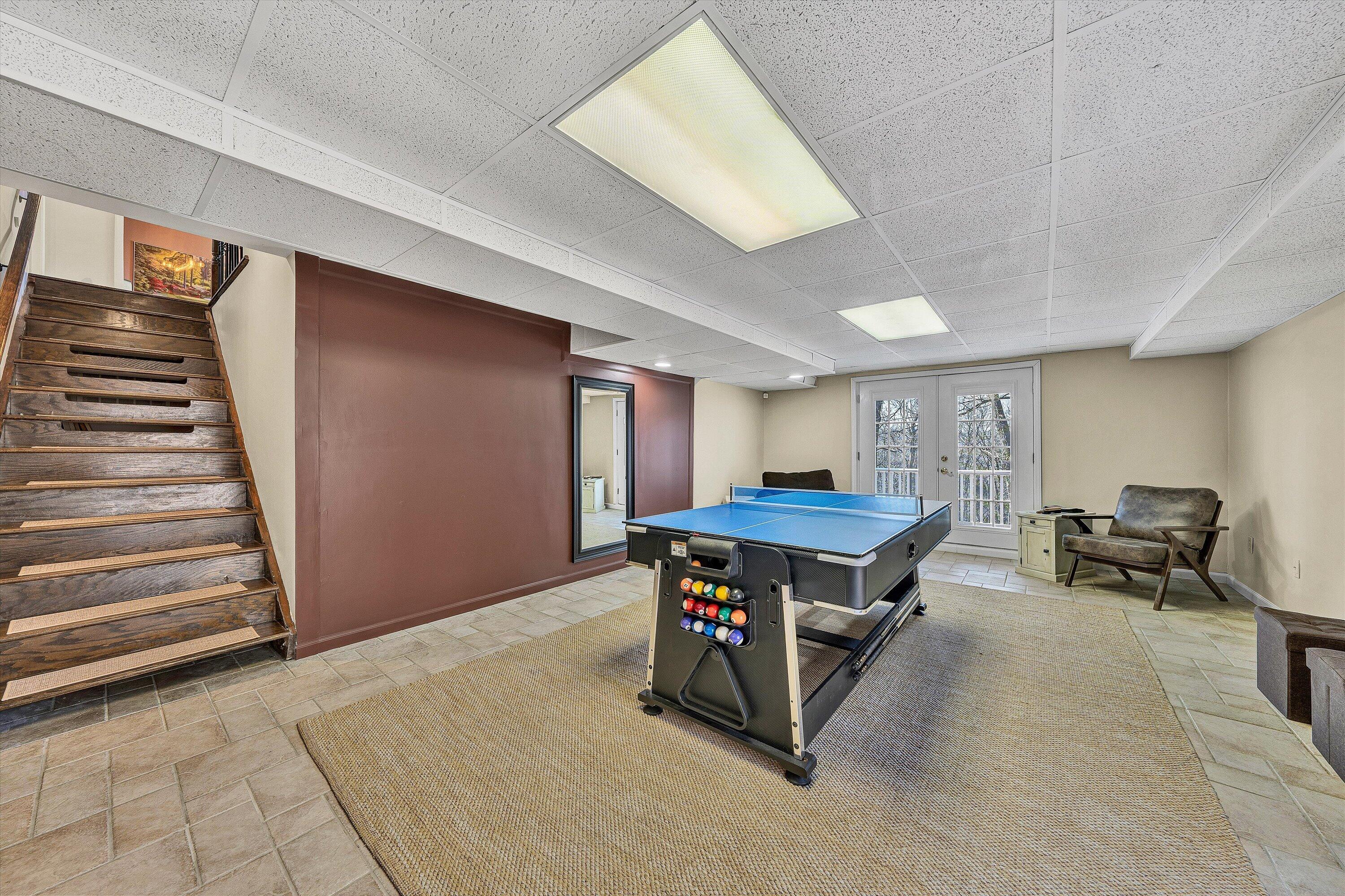 5157 Remington Road Roanoke, VA 24018 - Photo 38 of 63 a room with furniture and wooden floor