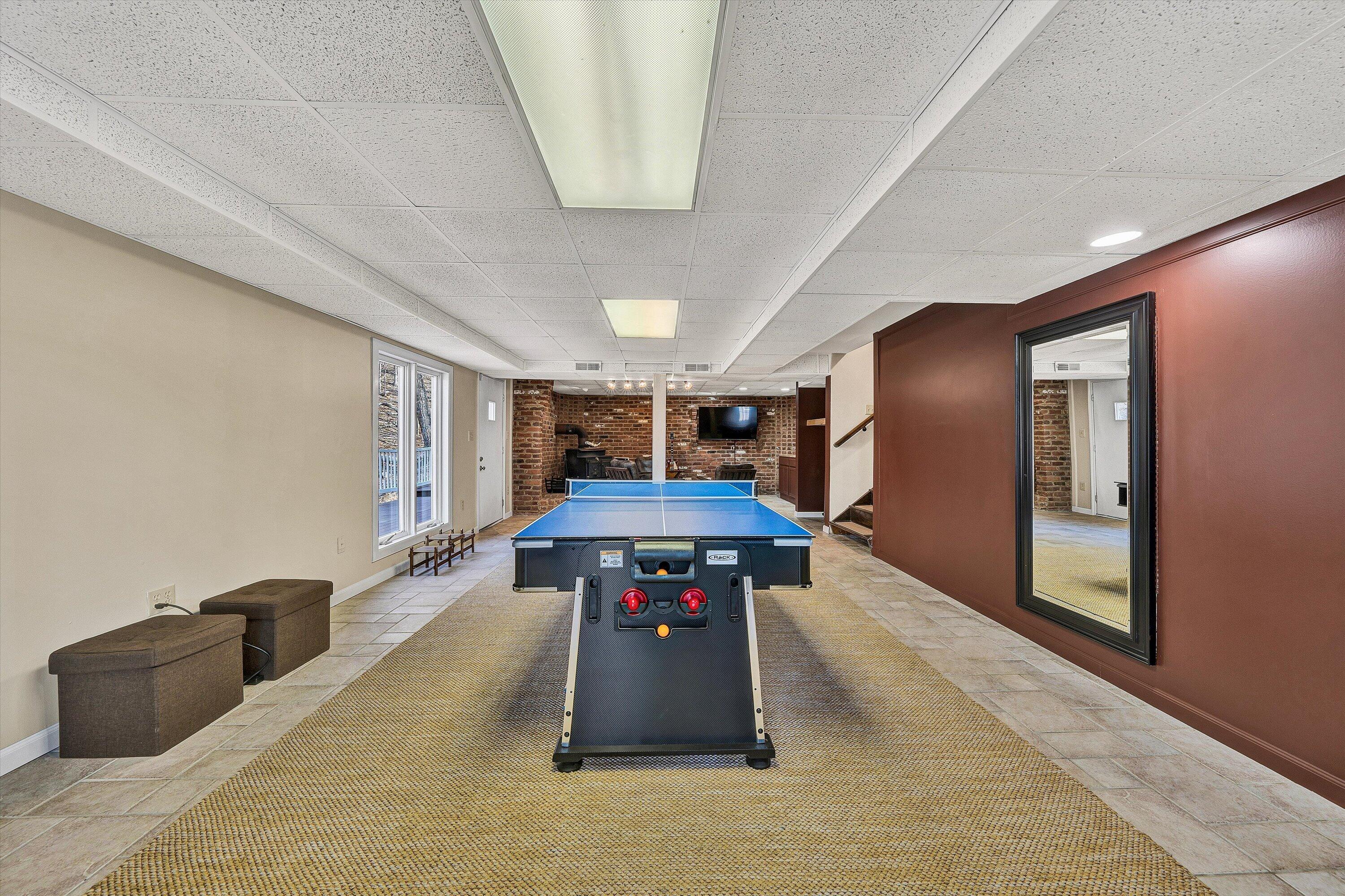 5157 Remington Road Roanoke, VA 24018 - Photo 39 of 63 a living room with furniture and a chandelier