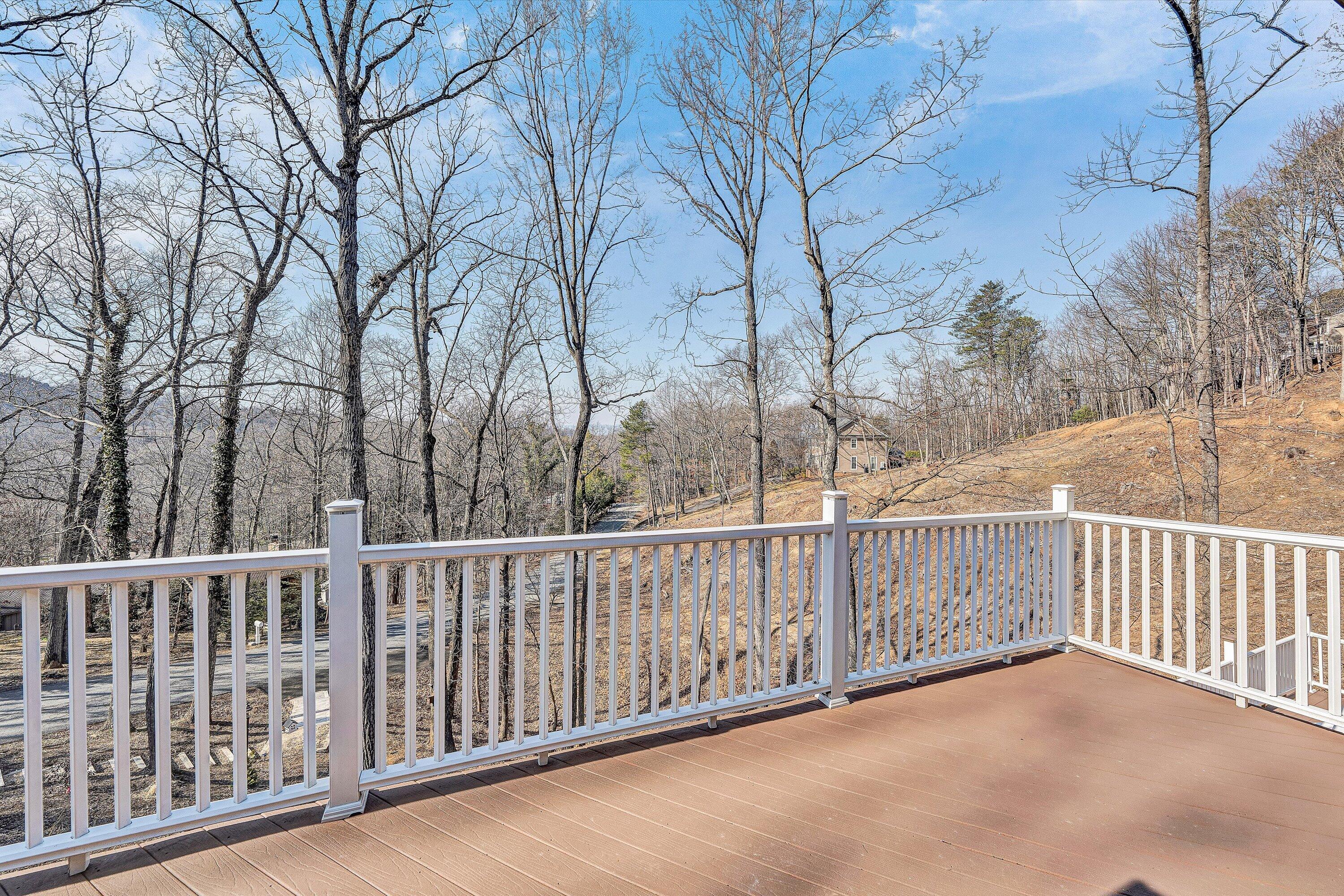 5157 Remington Road Roanoke, VA 24018 - Photo 6 of 63 a view of a wooden fence and trees