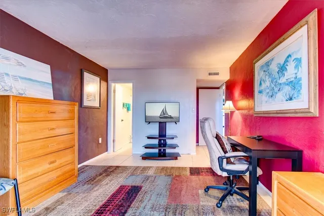 a room with furniture and wooden floor