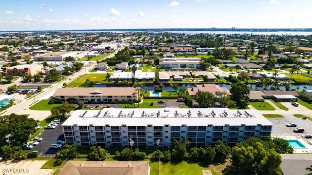 a view of swimming pool with outdoor seating
