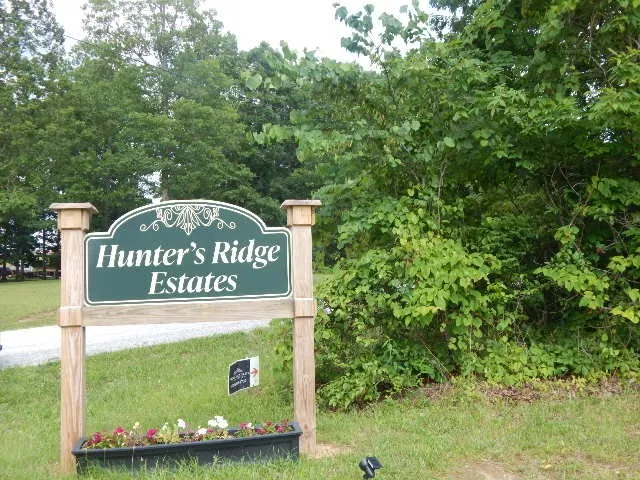 a sign on the side of the road