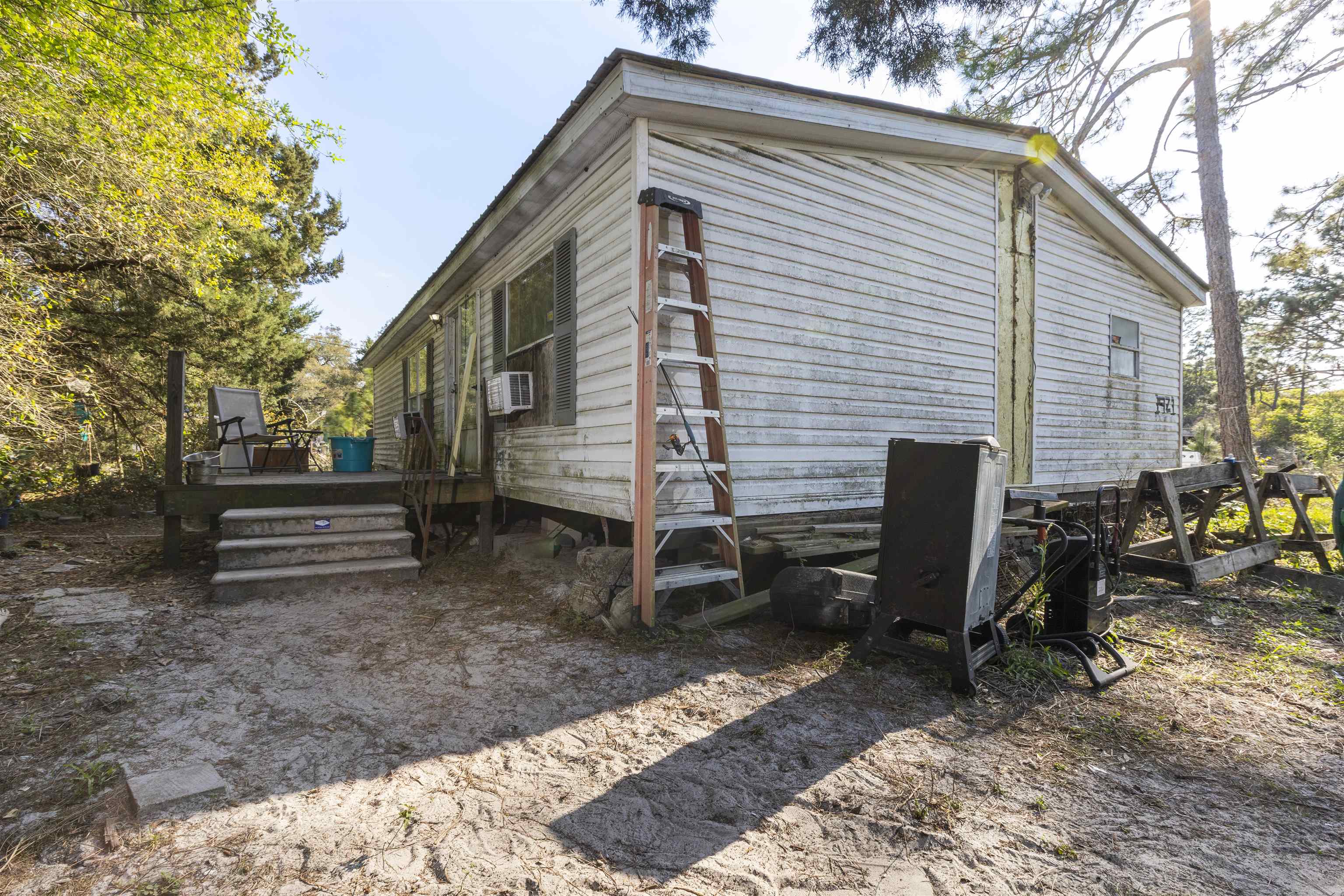 1931 Ryan Road St. Augustine, FL 32092 - Photo 20 of 34 View of side of home with a wooden deck
