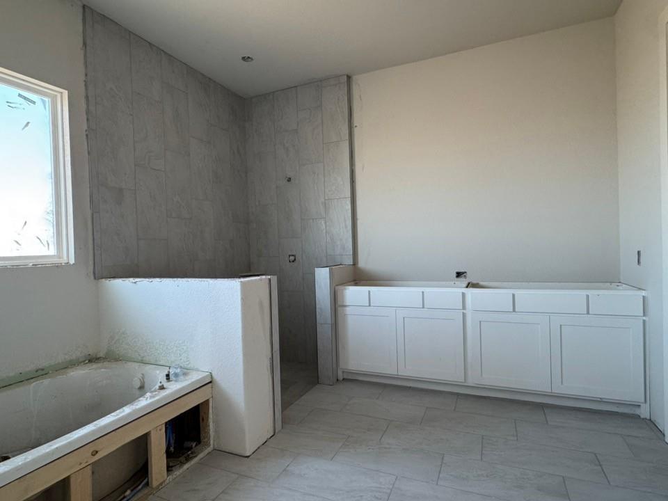 2316 Quartz Street Krum, TX 76249 - Photo 11 of 12 a utility room with dryer and washer