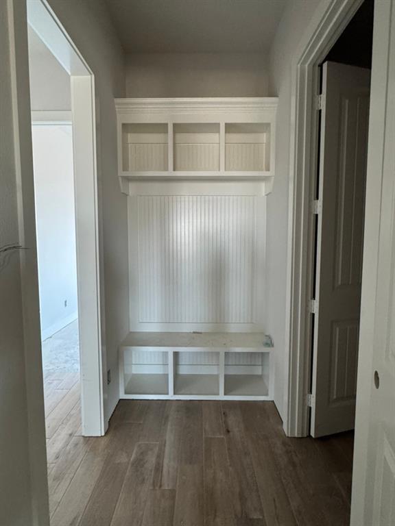 2316 Quartz Street Krum, TX 76249 - Photo 9 of 12 an empty room with wooden floor and closet