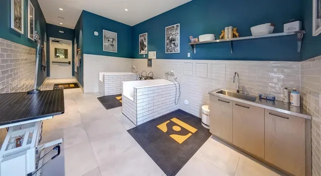 a view of kitchen and sink