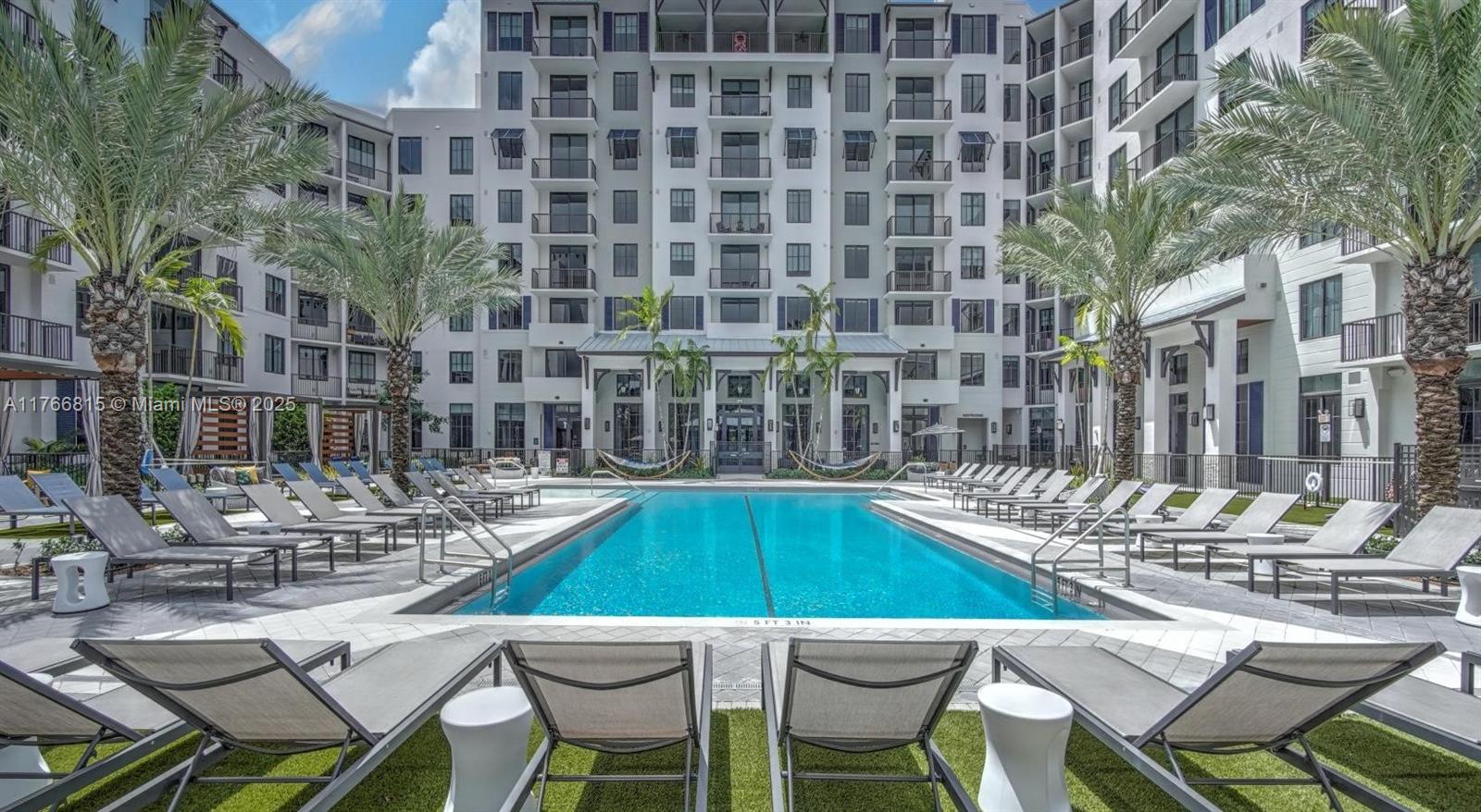 1301 Southwest 80th Terrace, Unit 205 Plantation, FL 33324 - Photo 9 of 16 a view of yard with outdoor seating