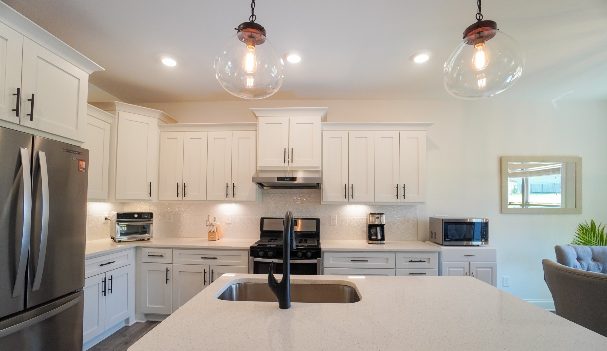 2737 West County Farm Road Springfield, TN 37172 - Photo 22 of 51 a kitchen with stainless steel appliances kitchen island granite countertop a sink and cabinets