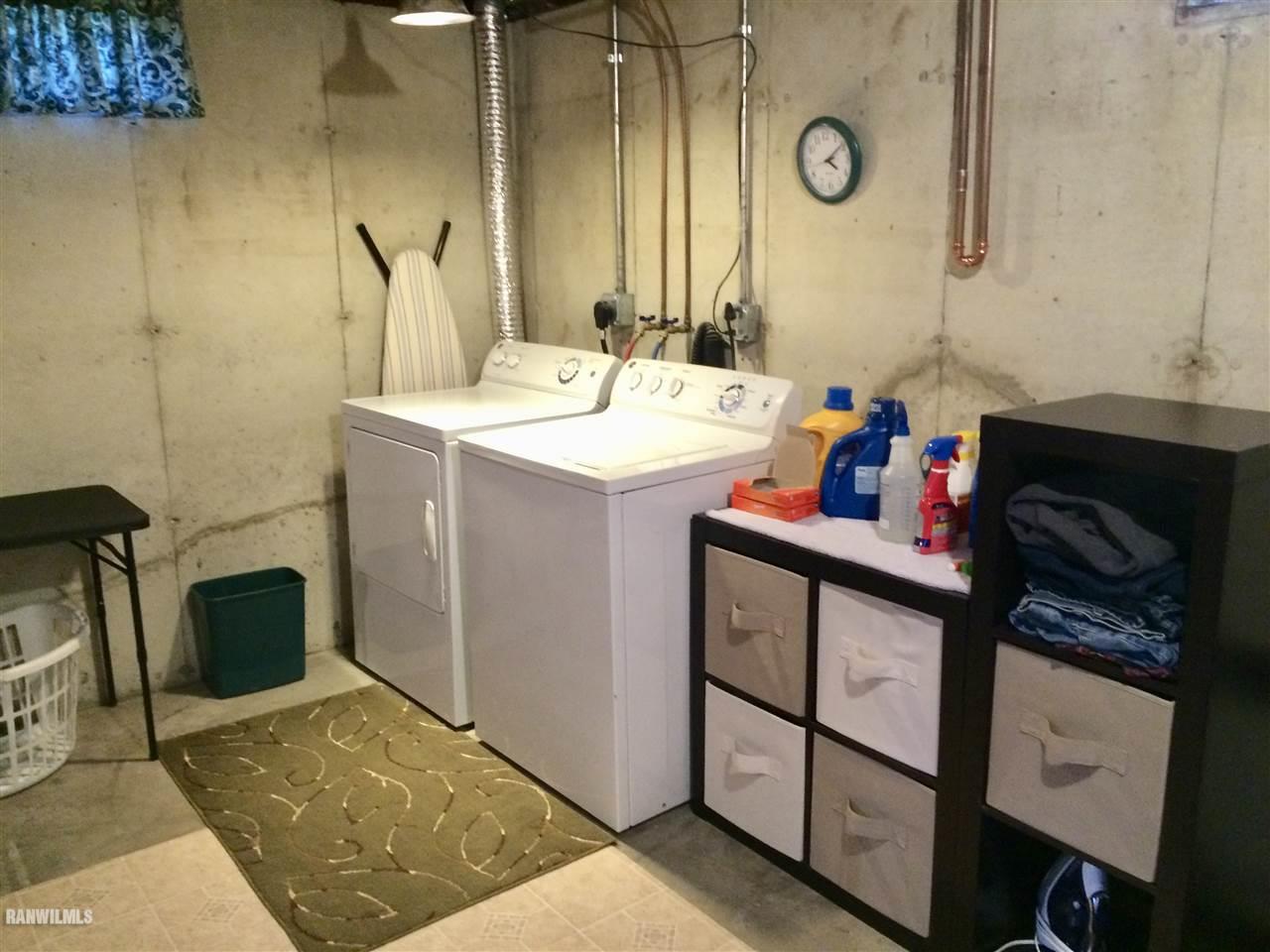 517 South Ridge Street Shannon, IL 61078 - Photo 19 of 21 a bathroom with a sink and a mirror