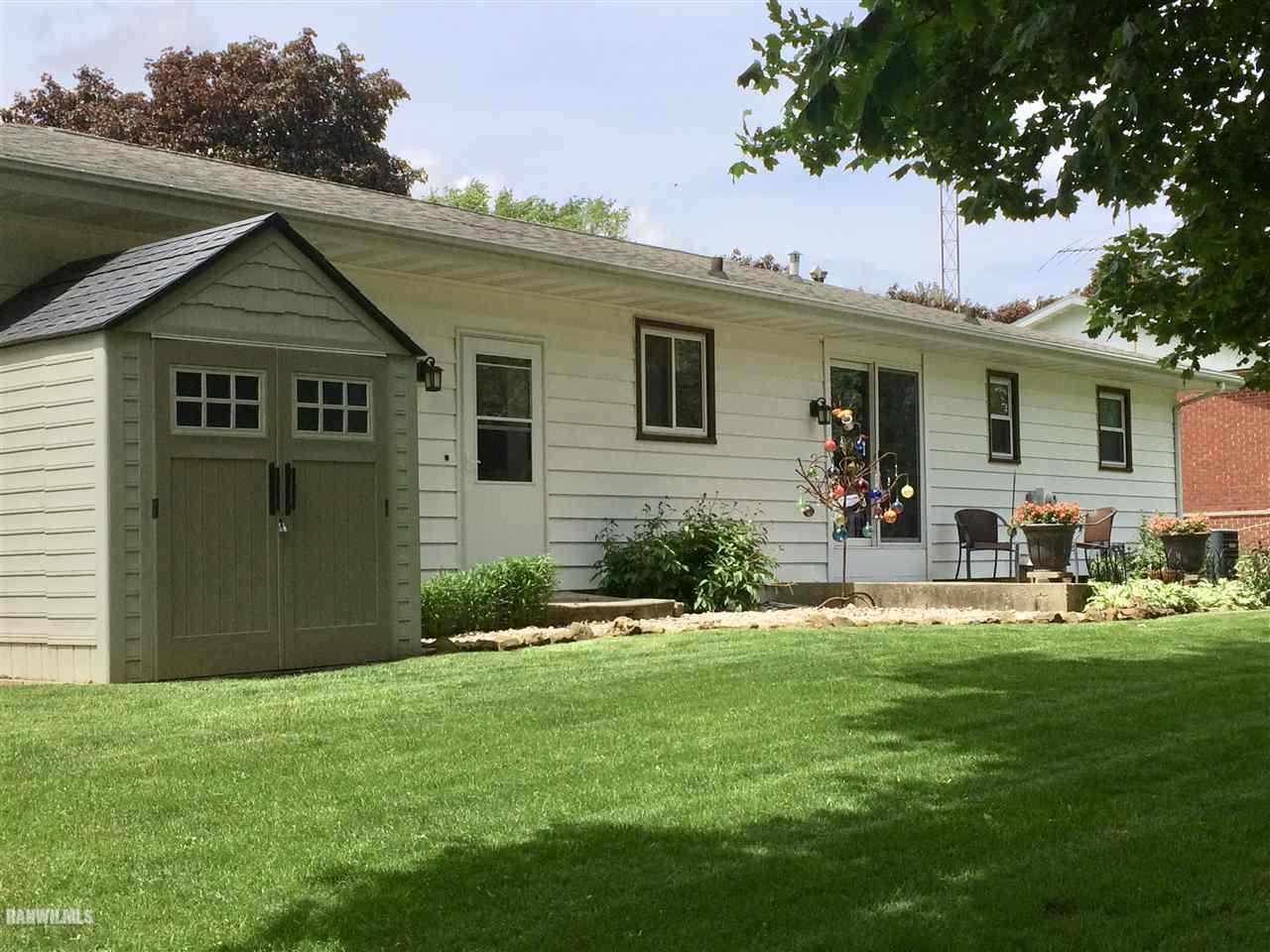 517 South Ridge Street Shannon, IL 61078 - Photo 20 of 21 a front view of house with yard and green space