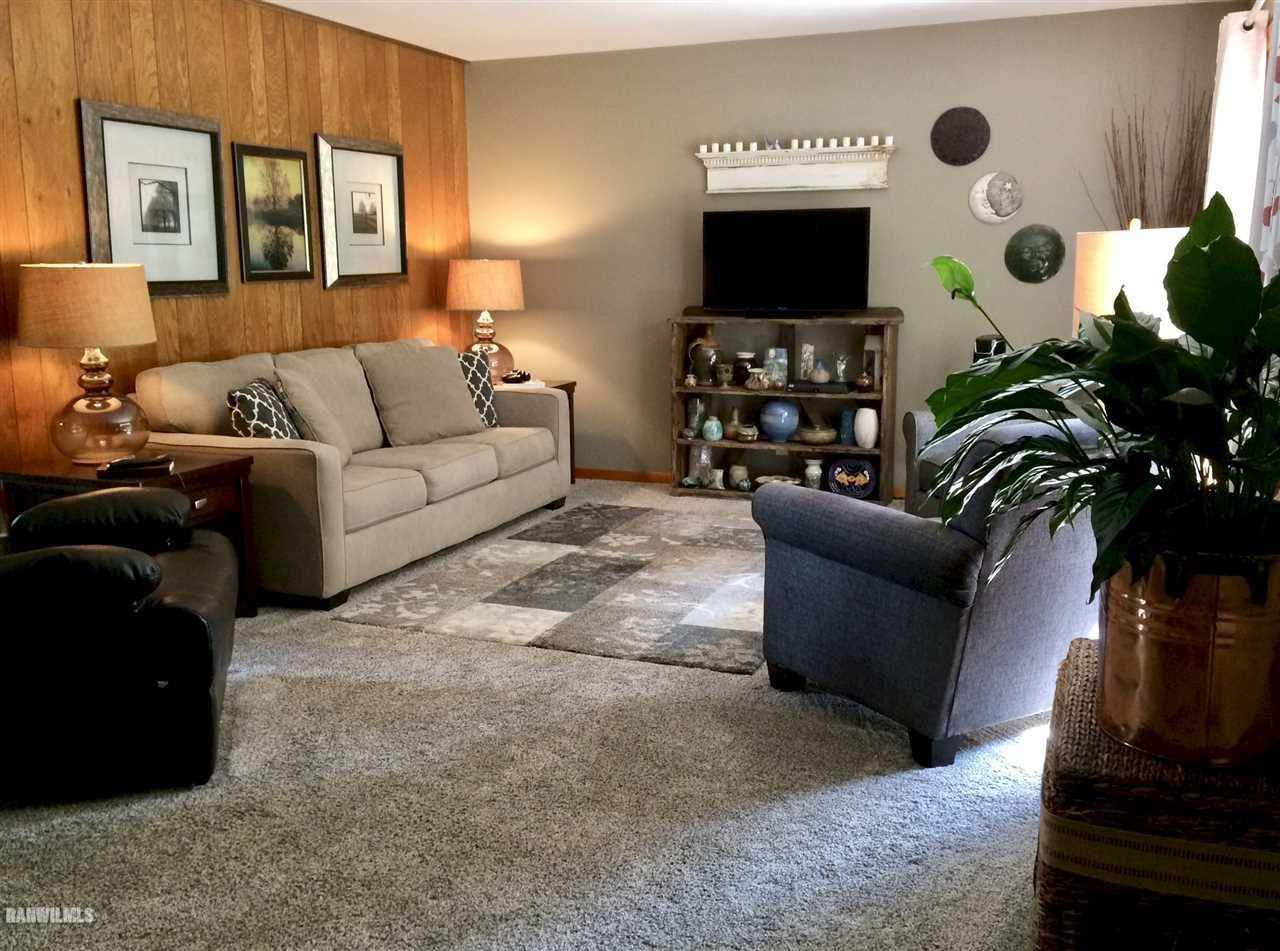 517 South Ridge Street Shannon, IL 61078 - Photo 3 of 21 a living room with furniture and a flat screen tv