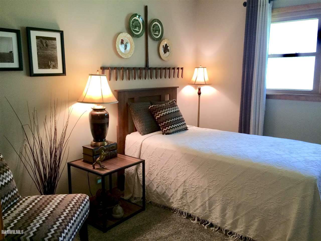 517 South Ridge Street Shannon, IL 61078 - Photo 10 of 21 a bedroom with furniture and a bed