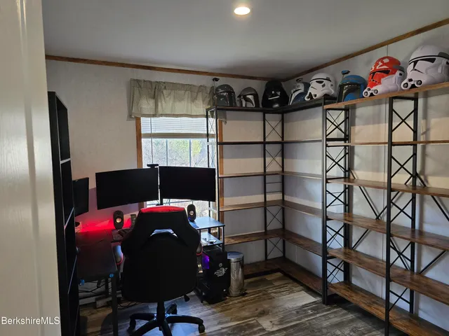 a bedroom with a bed and cabinets