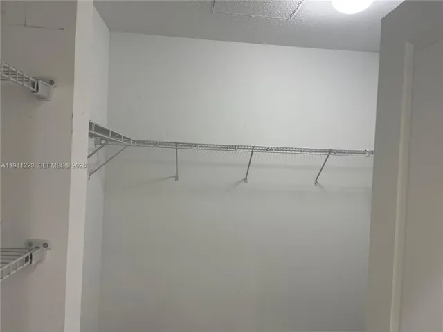 a view of a room with racks on the wall