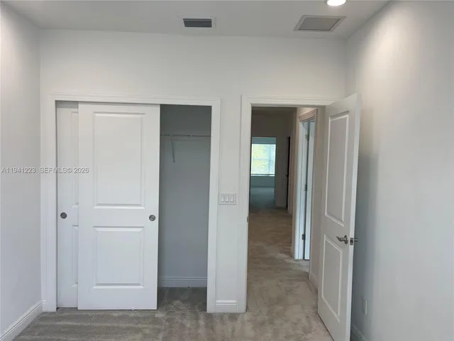 an empty room with closet