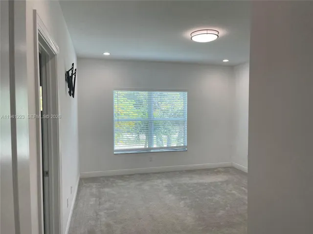 a view of a livingroom with a window