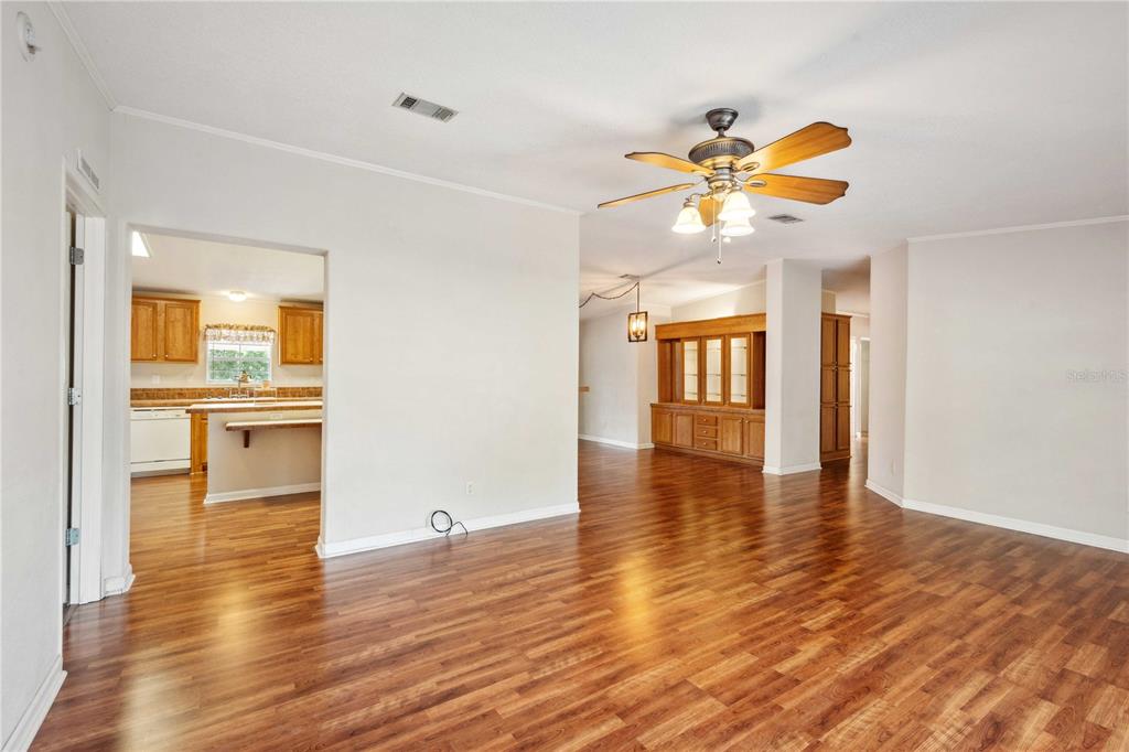 3319 Fox Ridge Boulevard Wesley Chapel, FL 33543 - Photo 20 of 50 a view of an empty room with window and wooden floor
