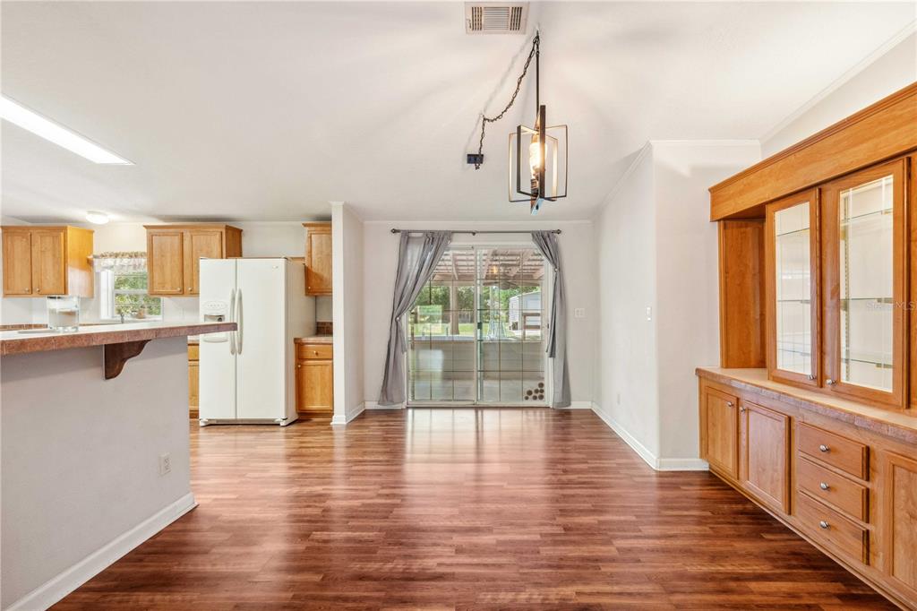 3319 Fox Ridge Boulevard Wesley Chapel, FL 33543 - Photo 22 of 50 a view of a kitchen with wooden floor and a window